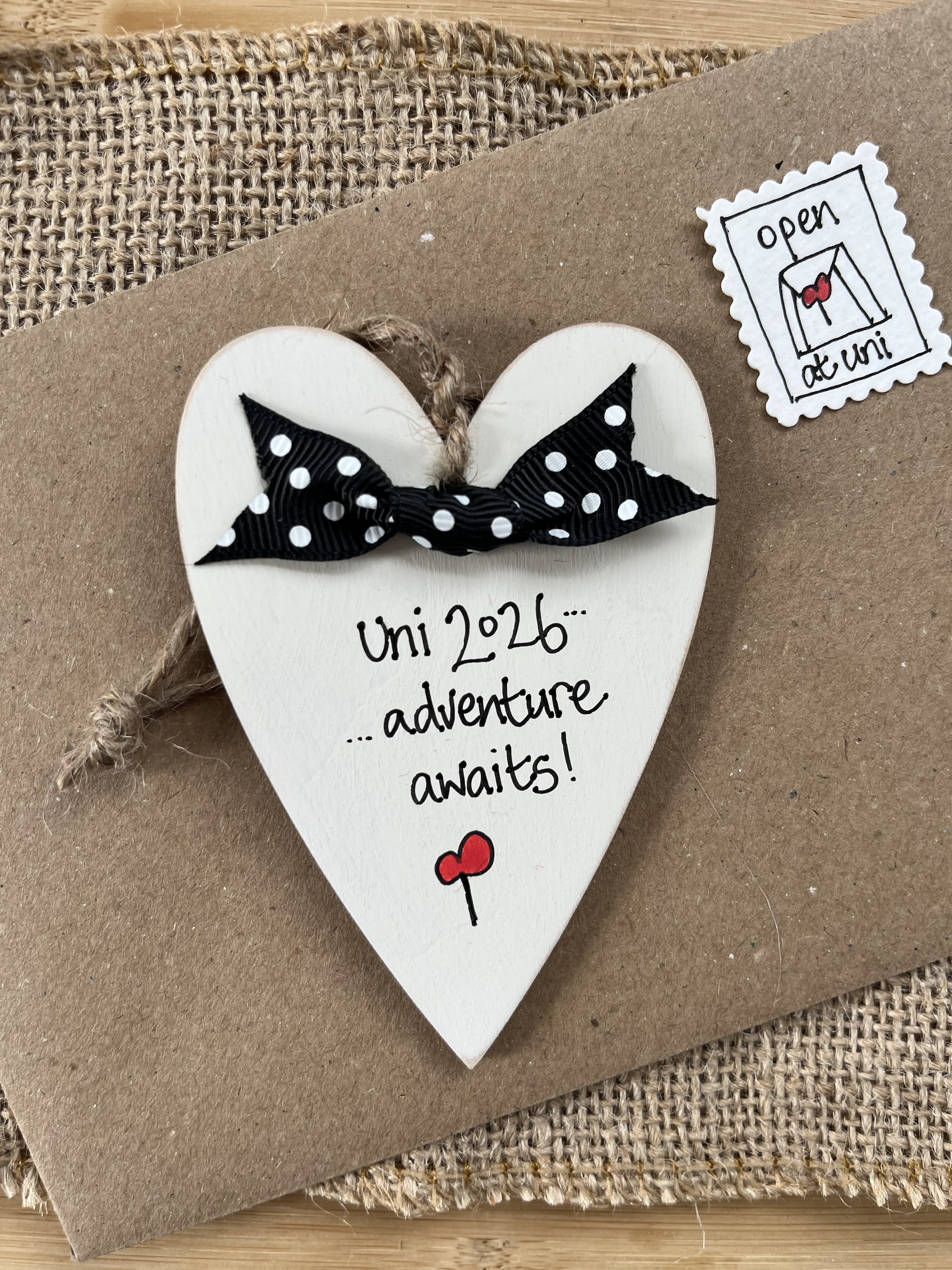personalised wooden heart leaving home gift with 'uni 2026 adventure awaits' message